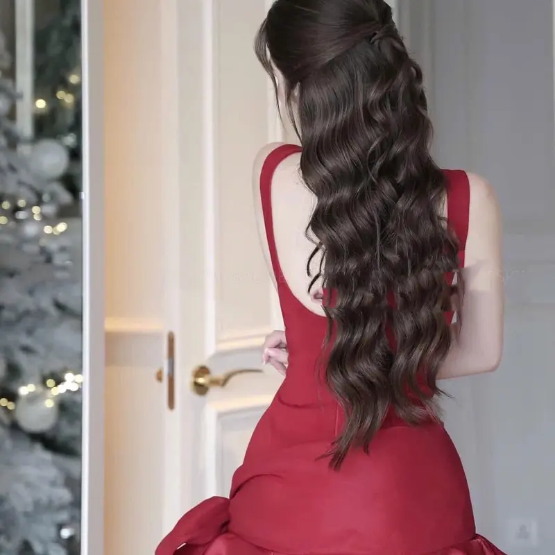 Đầm umi sát nách dáng ngắn đính nơ lệch 1