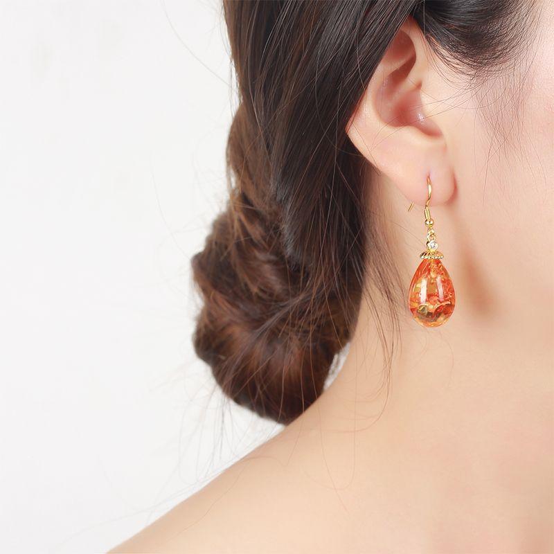 Product Introduction of Natural amber floral earrings, fashionable and versatile women's earrings, ethnic style earrings, pure silver ancient gold ear hooks 3