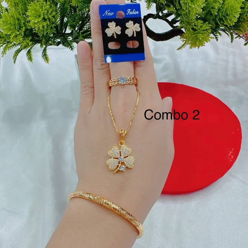 Bộ dây chuyền 4 món dây lắc nhẫn và bông tai( phụ nữ) Cao Su 7