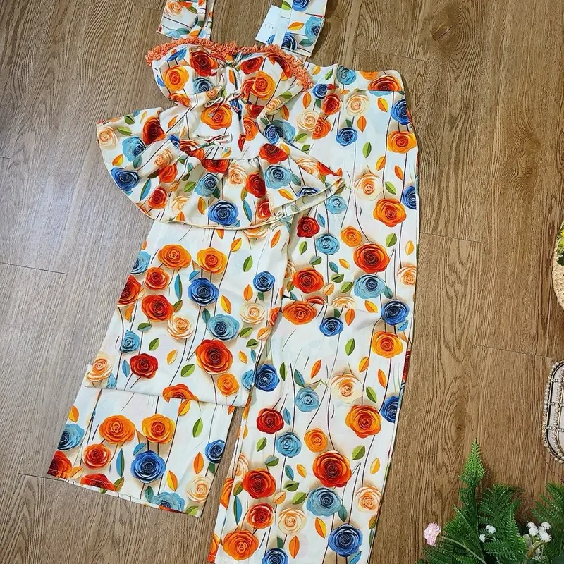 Bộ lụa mango cúp ngực tay cánh tiên, quần ống rộng bo lưng thun 0