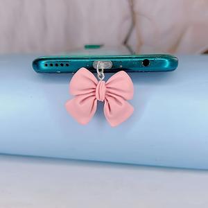 Enchufe contra polvo para teléfono con diseño de lindo moño, 1 pieza de cubierta para puerto de carga de teléfono de diseño creativo, accesorios para teléfono compatibles con iPhone y Android
