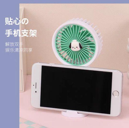 Product Introduction of Quạt mini cầm tay, tích điện, nhỏ gọn xinh xắn, có đế để điện thoại, sạc usb và sticker 1