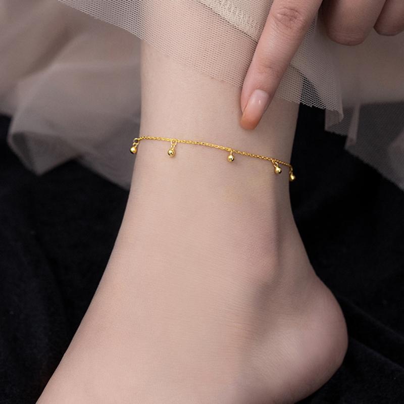 Lắc chân nữ bi sợi mảnh làm bằng titan cao cấp mạ vàng 24k thiết kế nhiều bi tròn xinh xắn phong cách nhẹ nhàng thanh lịch không đen hoen gỉ không dị ứng da bền màu 1-2 năm. tắm giặt thoải mái.