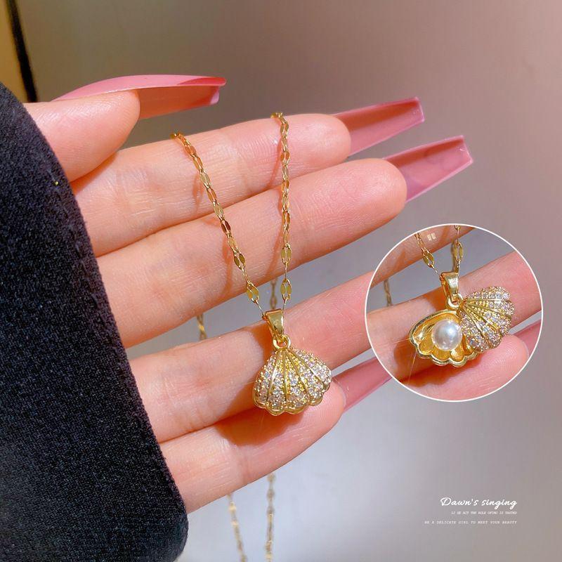 Product Introduction of Fashion Pearl Shell Necklace for Women Titanium Steel Non-Fading Gold Shell Pendant Simple Elegant Clavicle Chain trinkets butterfly  design  pendant  habib limbal  ring sardonyx chain  heart  necklace pendant  butterfly tyla  water  necklace starry  jewe 7