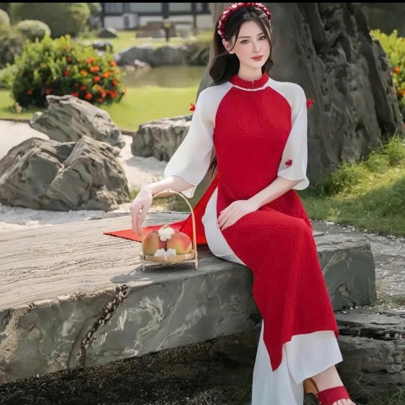 Product Introduction of Set áo dài cách tân áo tuyết nhung phối tơ cổ cao đính nơ tay lỡ xẻ tà mix quần dài ống rộng xinh xắn thích hợp cho các nàng diện đi chơi,đi lễ. Women top 16