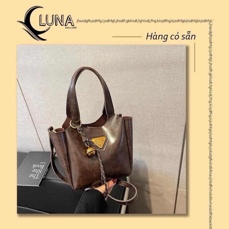 Túi xách bucket khoá xoay size 22 phối xích và dây đeo thổ cẩm xao cấp đeo vai, đeo chéo