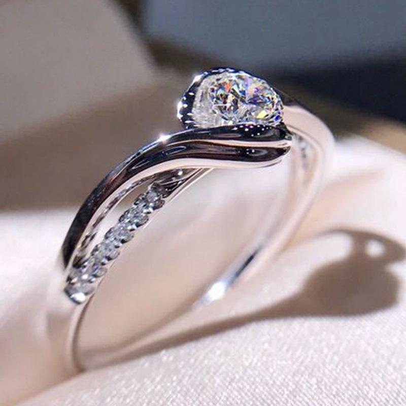 Product Introduction of European and American Light Luxury Style Index Finger Ultra Shiny Carat Zircon Geometric Diamond Engagement for Women Cross-border E-commerce Hot Sale ring avulsion 40