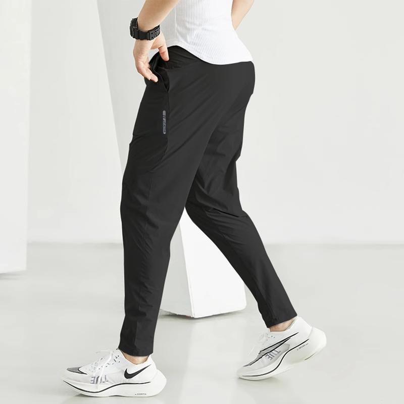 QUẦN GIÓ Thể thao nam dáng dài, vải gió co giãn thoải mái, kiểu dáng trẻ trung năng động QGD