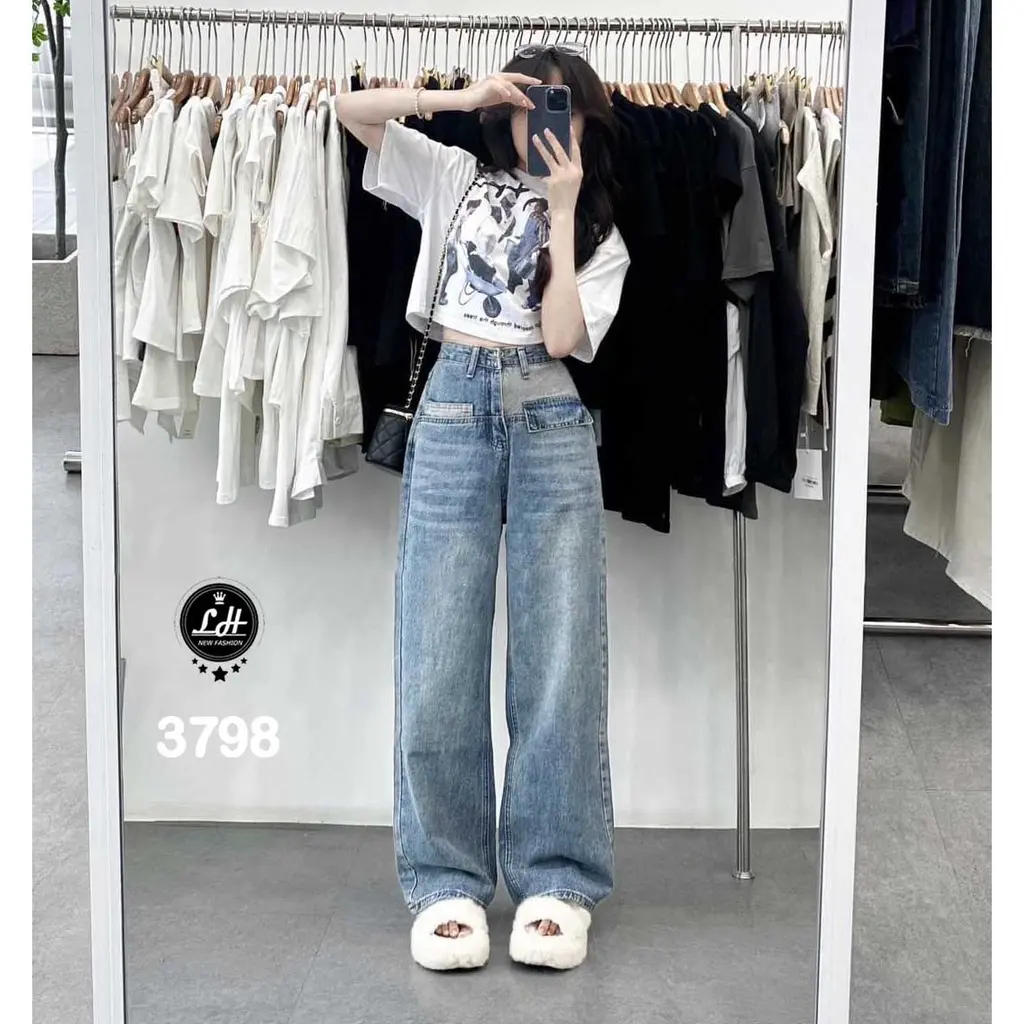 Quần jeans nữ ống rộng màu xanh túi kiểu lật lạ mắt