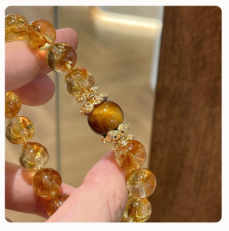 Product Introduction of Natural Yellow Pagoda Crystal Tiger Eye Stone Unique Niche Wealth-Attracting Bracelet for Women Large Round Beads Accessories Wholesale from Manufacturer 2