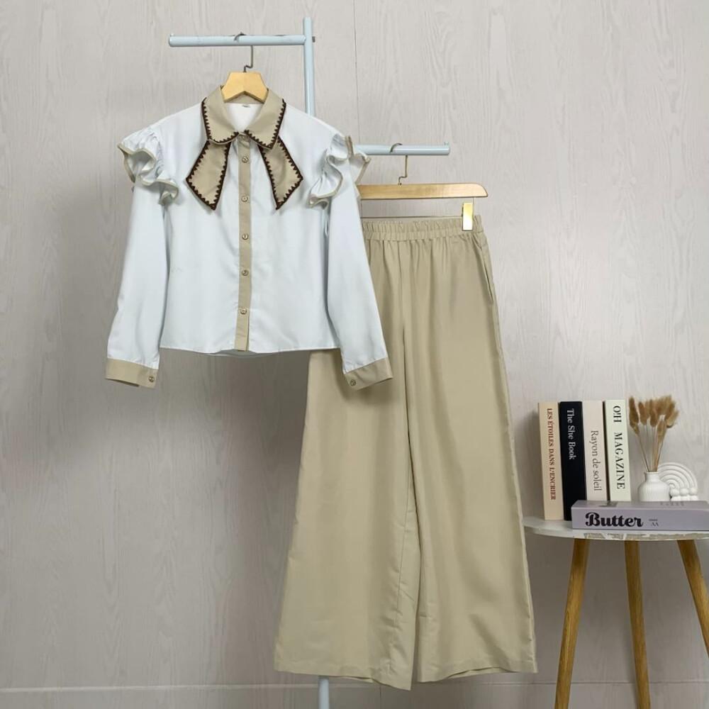 Asaya Setelan dua potong atasan dan celana longgar dengan kombinasi warna yang stylish dan terbaru.