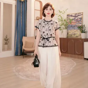FADFAD setelan dua potong wanita tempramen motif bunga cantik dengan tali pinggang manis dan celana panjang