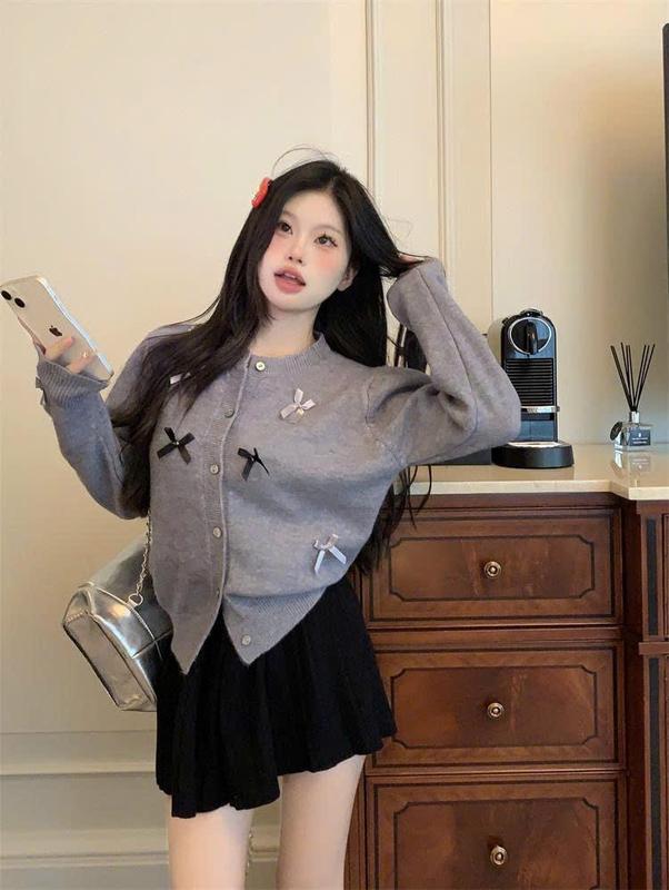 Áo Khoác Len Lông Thỏ Đính Nơ Trắng Đen Dễ Thương Cổ Tròn Cúc Ngọc Phong Các Hàn Quốc Mặc Giữ Ẩm Mùa Đông Camcloset top Women