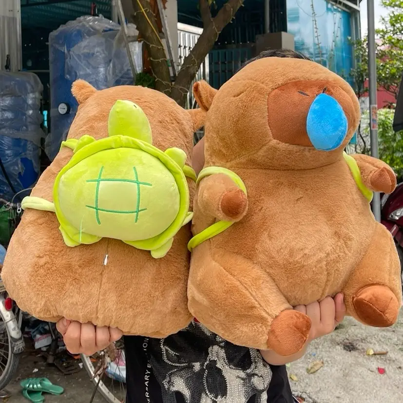 Gấu capybara rút mũi Nâu size 55cm khổ vải ( tặng kèm balo rùa ) Toy