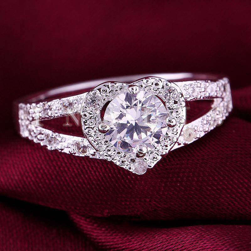 Product Introduction of Fashion Heart-Shaped Ring Hot Sale Ring Silver Plated Women's Ring European and American Zircon Gift All-Match Earrings 2