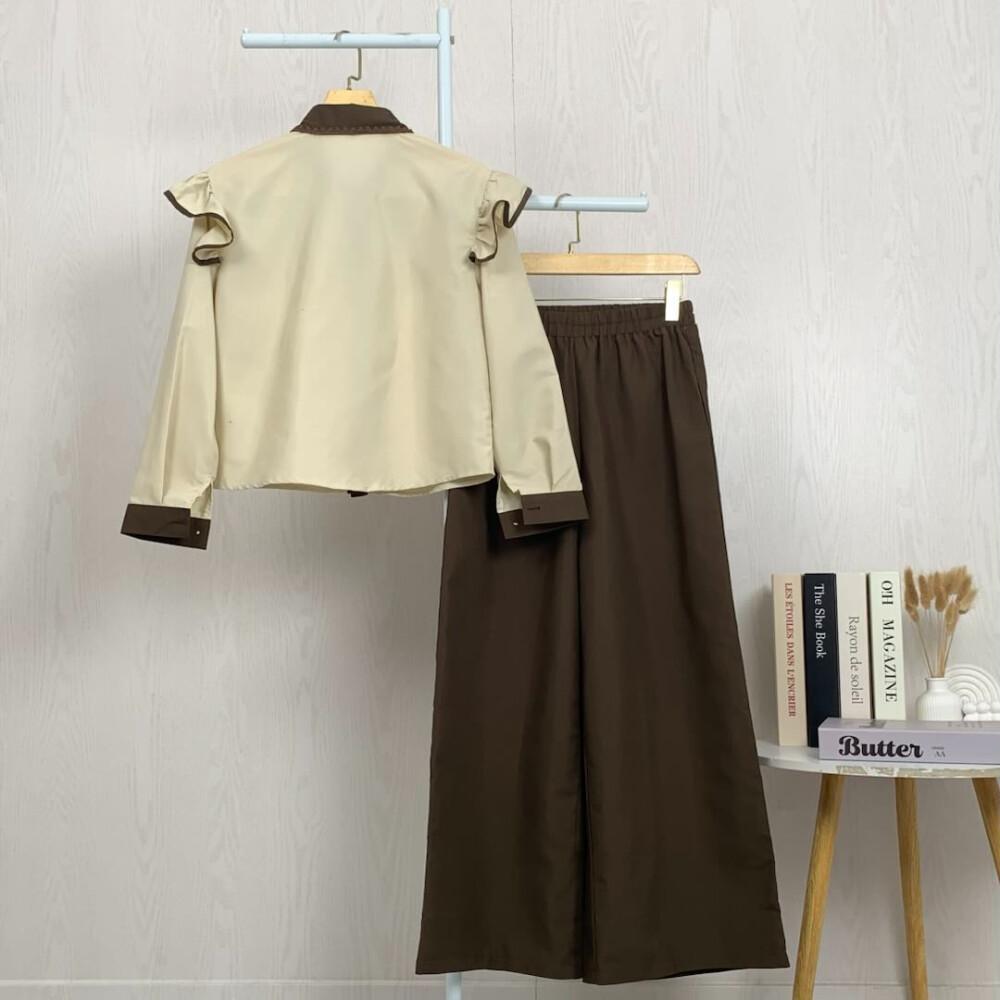 Asaya Setelan dua potong atasan dan celana longgar dengan kombinasi warna yang stylish dan terbaru.