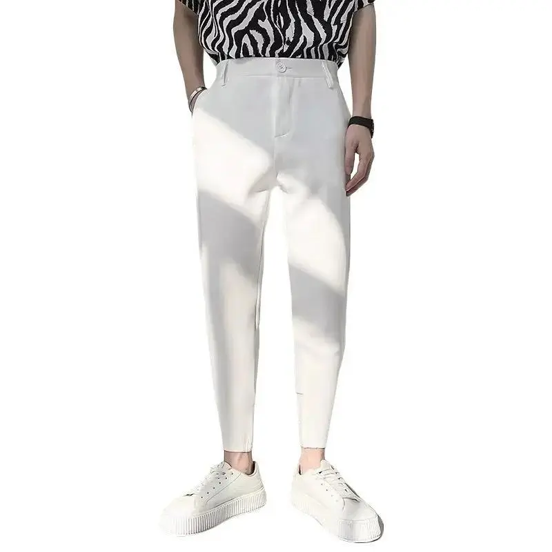 Quần Tây Nam Cao cấp màu trắng, chất vải cotton co giãn nhẹ.