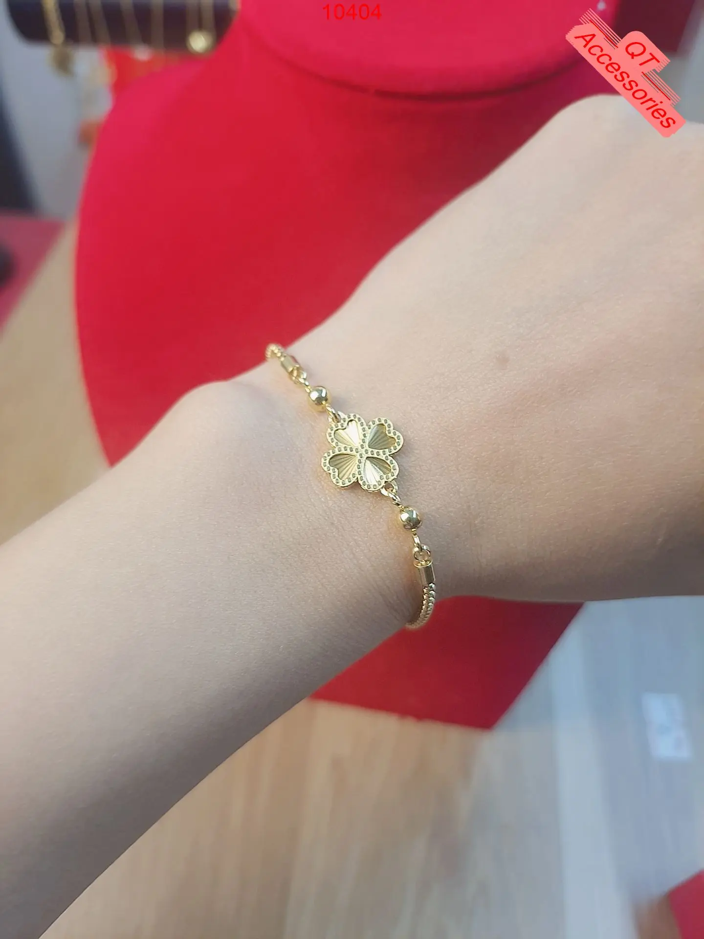 10404 - Lắc tay titan mạ vàng 99k dây trơn cỏ bốn lá