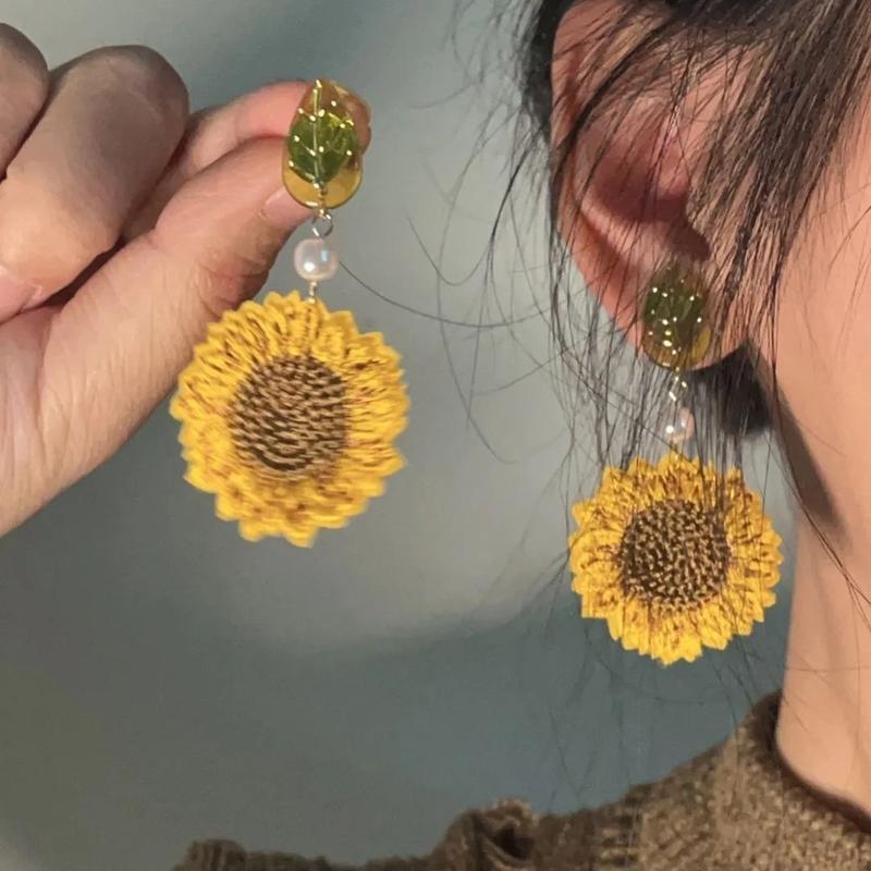 Product Introduction of [1325 Positive Reviews] Sunflower Pastoral Style Flower Non-Pierced Earrings Retro Mosquito Coil Cloth Art Studs Hong Kong Style Elegant Woven Ear Clips 5