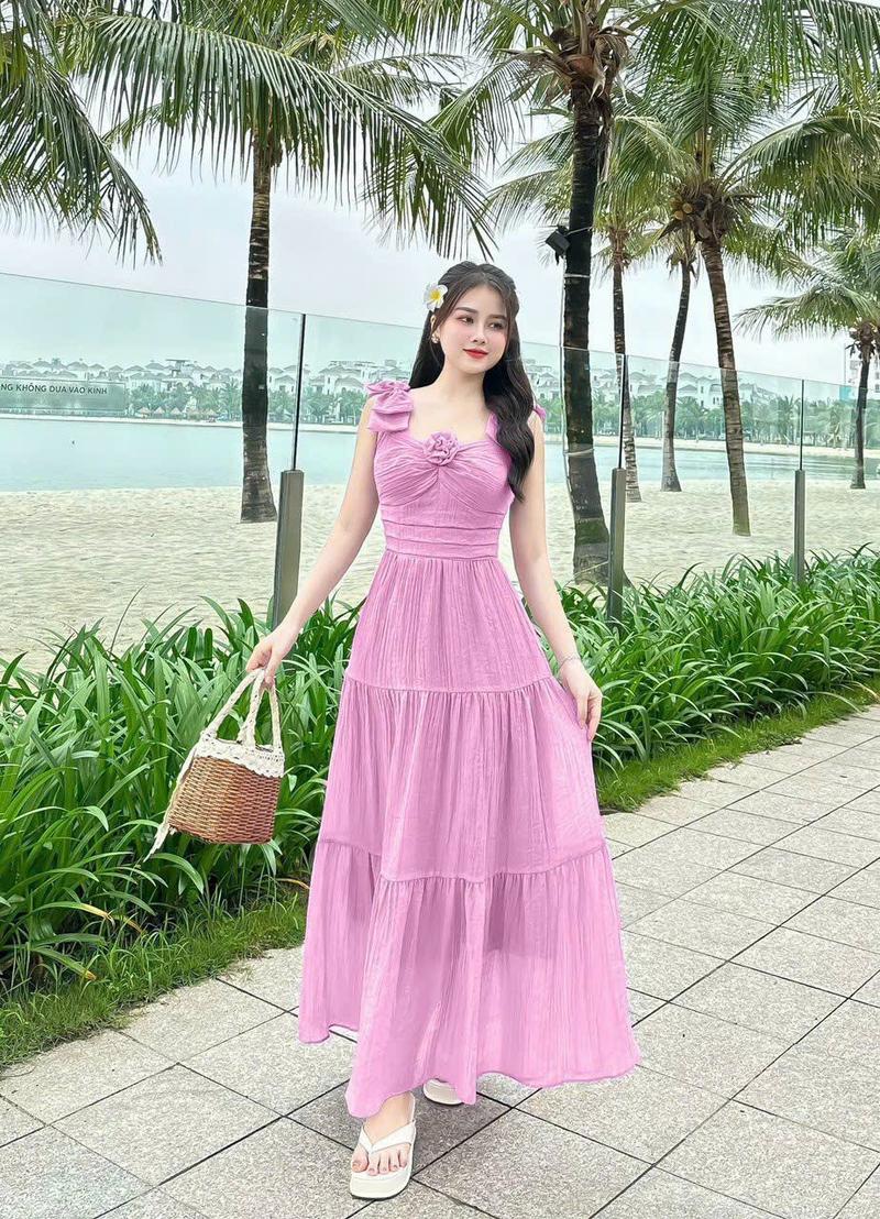 Product Introduction of Đầm maxi thời trang nữ mặc đi biển chất tăm gãy vai nơ ngực gắn bông váy dài xòe maxi có lót trong có 5 màu như hình qc Màu Hồng 2