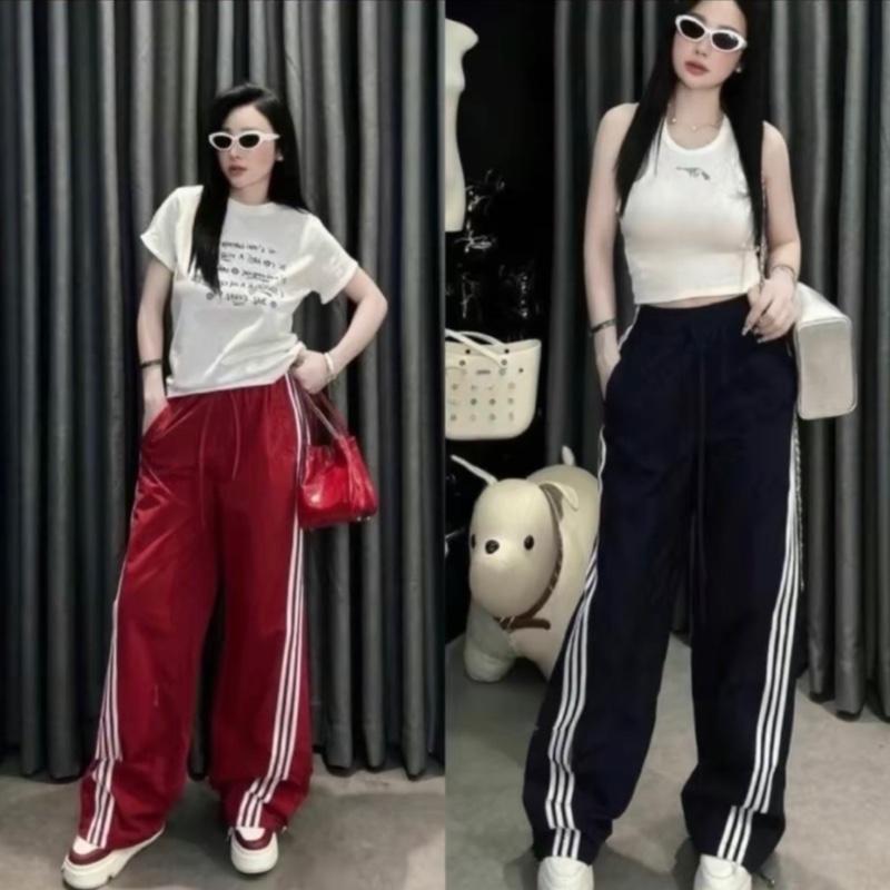 (Combo 2 quần) Quần dài ống rộng. Quần gió lưng chun có dây rút ống quần. Mặc được 2 kiểu xuông và Jogger. Quần gió thời trang Hàn quốc, kiểu dáng thể thao cho nam, nữ. 0