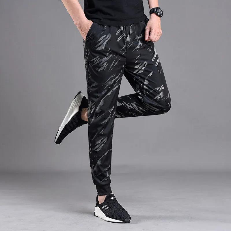 Product Introduction of Autumn Trousers Men Stretch Camouflage Pant Casual Leg Fitting Sweatpants Loose Wear-resistant Trousers 11