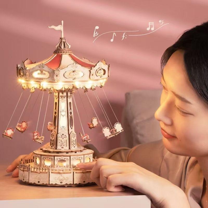 Product Introduction of Music Box Puzzle Aerial Flying Chair DIY Handmade Model Building Blocks 3D Puzzle Model Wooden Toy Driving Assembly 8