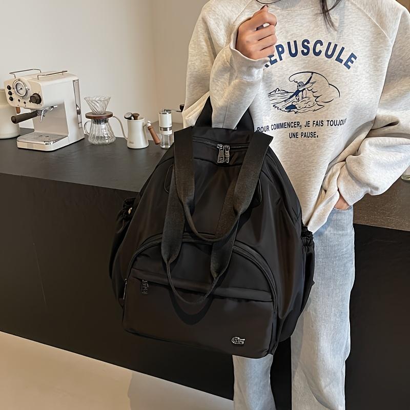 Product Introduction of Large Capacity Commuting Travel Shoulder Bag Fashionable Versatile Backpack Parent Bag Women's Casual Bag Oxford Cloth Handbag Adjustable Strap Zipper Closure 4