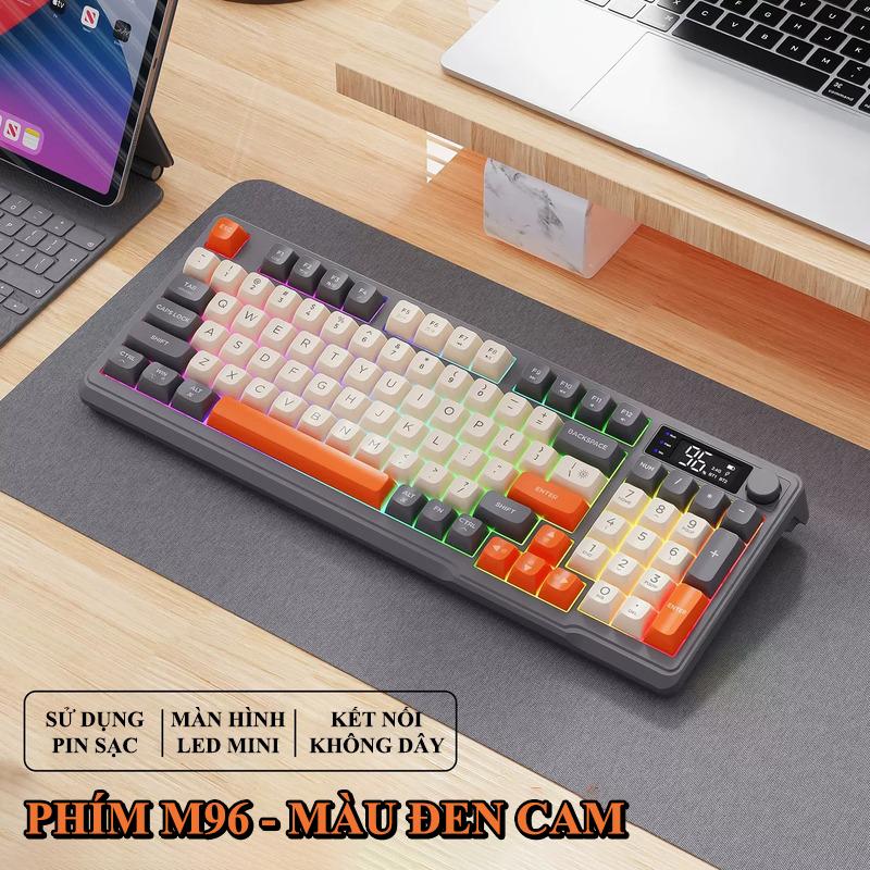 Bàn phím không dây FREEWOLF M96 kết nối bằng Bluetooth và 2.4G có đèn led 7 màu, nút văn âm lượng và màn hình led MINI