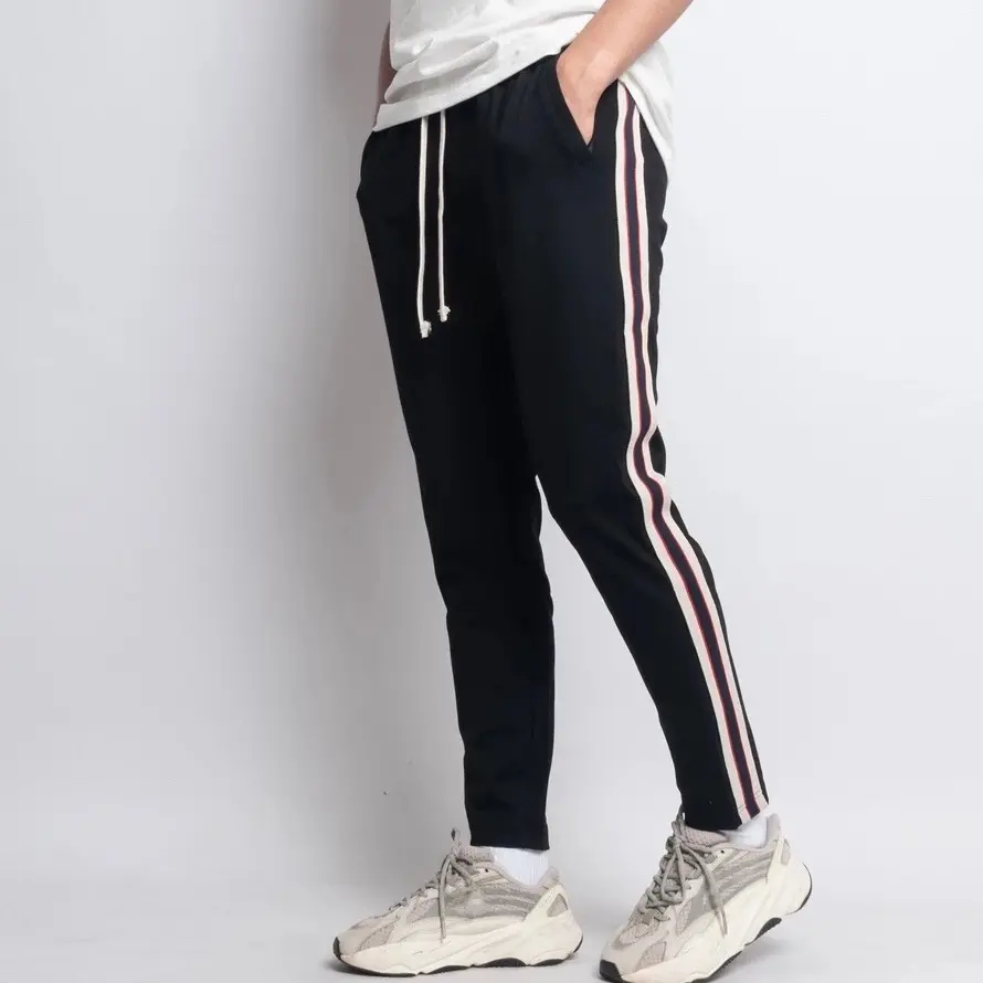 Huyền Bông Store- Quần Dài Phối Sọc Ống Buông Và Bo,Umi Hàn,Nam Nữ,3 Túi Khoá.Dây rút vàng Menswear