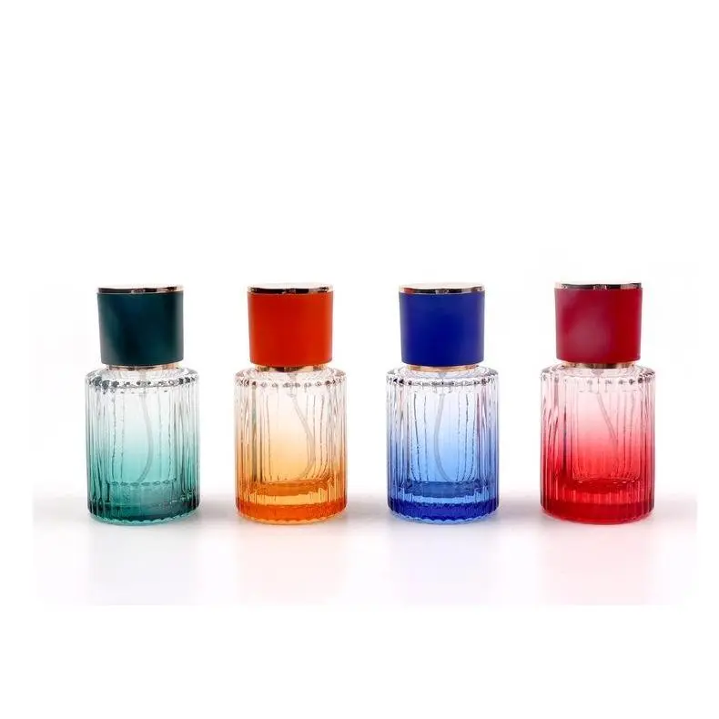 [HCM] Chai chiết nước hoa 30ml dáng trụ thân thủy tinh nhiều màu dày dặn, vòi xịt phun sương.