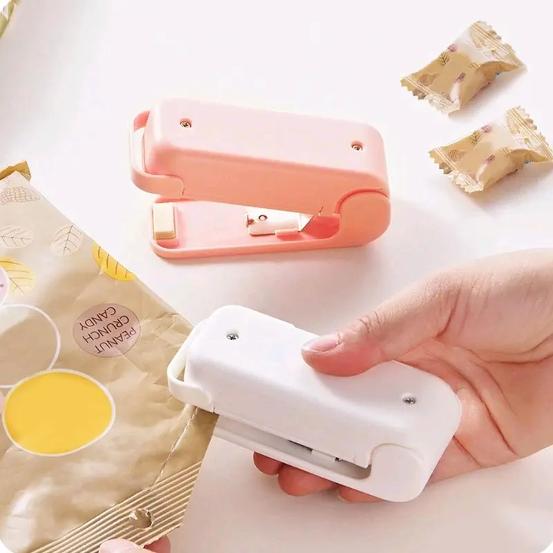 Alat Segel Perekat Press Hand Heat Sealer Bungkus Kantong Plastik Makanan Snack Cemilan Portable Mini 1