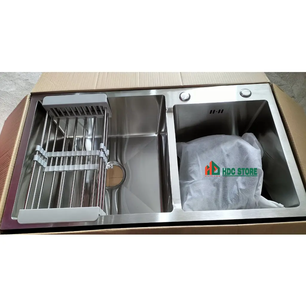 Chậu rửa bát  2 hố lệch, đúc khối inox 304,đầy đủ xiphong và phụ kiện đi kèm, có nhiều size lựa chọn