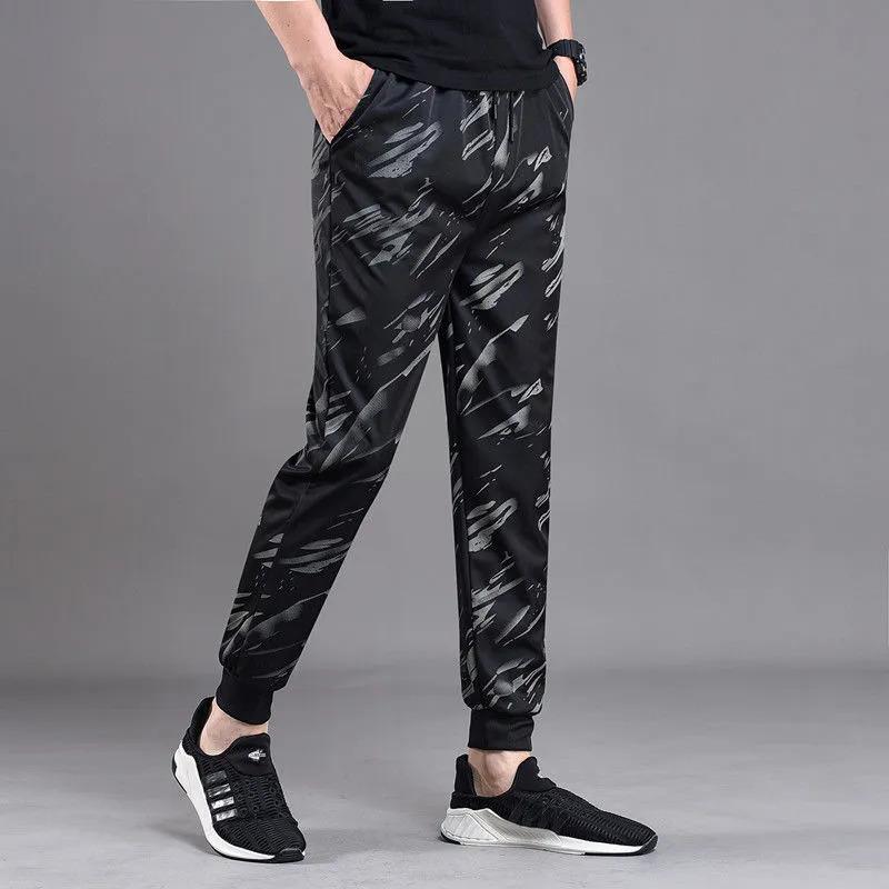 Product Introduction of Autumn Trousers Men Stretch Camouflage Pant Casual Leg Fitting Sweatpants Loose Wear-resistant Trousers 8