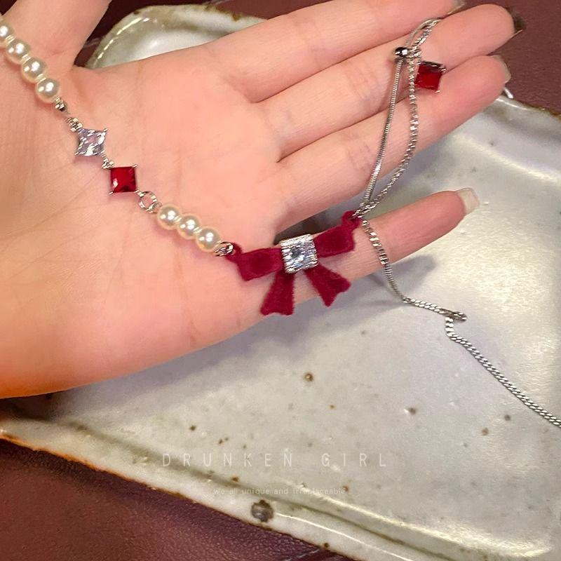 Product Introduction of Red Bow Pearl Necklace for Women New Popular Clavicle Chain Noble Niche Necklace Light Luxury High-Grade Accessories 8
