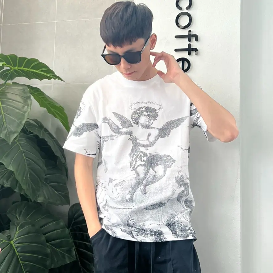 Áo phông Nam Nữ in hình thiên thần. hai màu đen trắng.