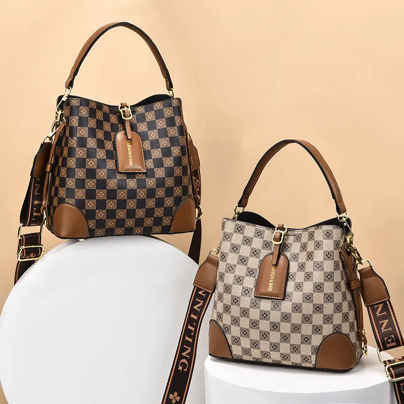 Hot sale, retro fashion women's handbag, 2023 new style, stitching, contrast color printing, shoulder bag, diagonal bag, bucket bag, female models.