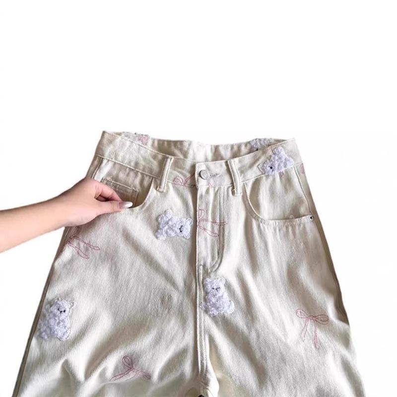 2025 Hàng sẵn có jeans thẳng thêu gấu vàng kem cho phụ Thiết kế mới Dễ thương…