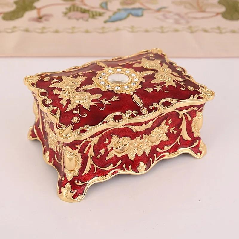 Product Introduction of European retro jewelry box metal enamel color creative ring necklace earrings storage box knot marriage gift 18