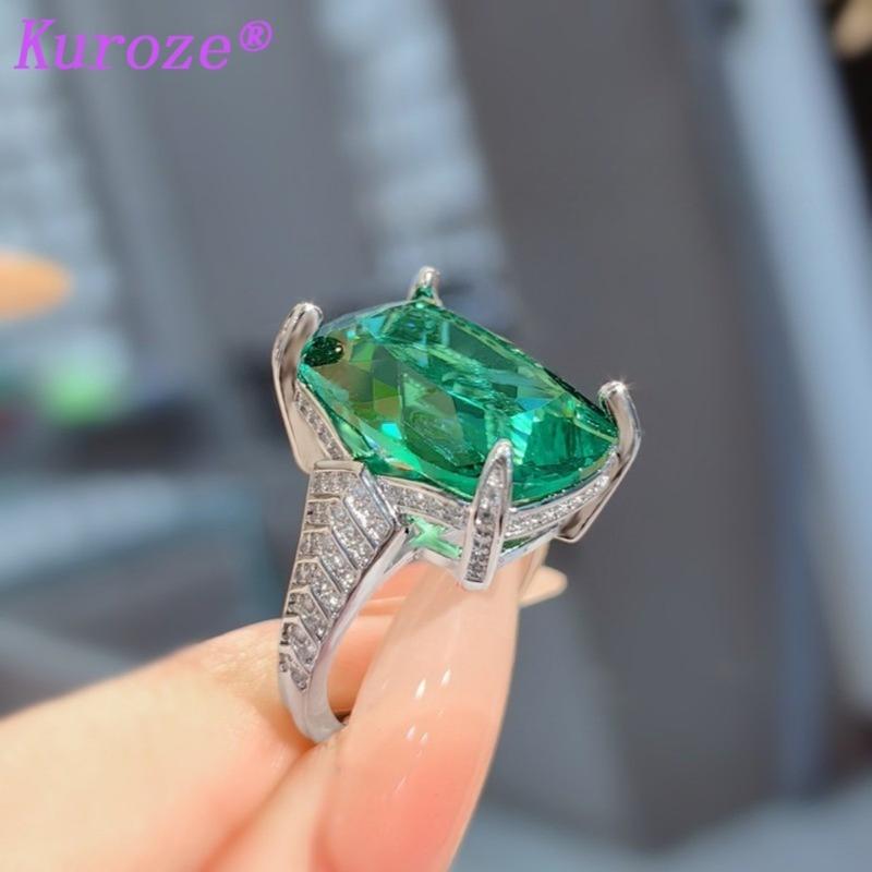 Product Introduction of Kuroze new royal blue pigeon blood red pendant large carat fat square colored treasure earrings Paraiba ring green diamond suit women 21