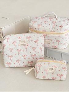 Bolsa de maquillaje acolchada con patrón de moño y flor, conjunto de bolsas de almacenamiento de cosméticos portátiles y lindas, esencial para viajar, bolsa de maquillaje para almacenar artículos de aseo diarios