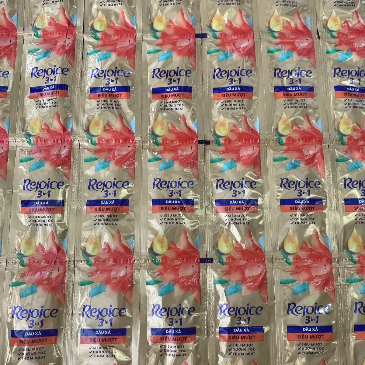 100gói Dầu xả Rejoice siêu mượt mỗi dây 10gói