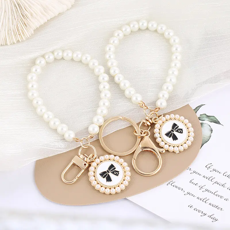 Mặt Dây Chuyền Tròn Ngọc Trai, Thiết Kế Sáng Tạo, Với Thắt Nơ, Móc Chìa Khóa, Thích Hợp Cho Xe Hơi, Phụ Kiện Đồ Trang Trí Túi Cặp Đôi