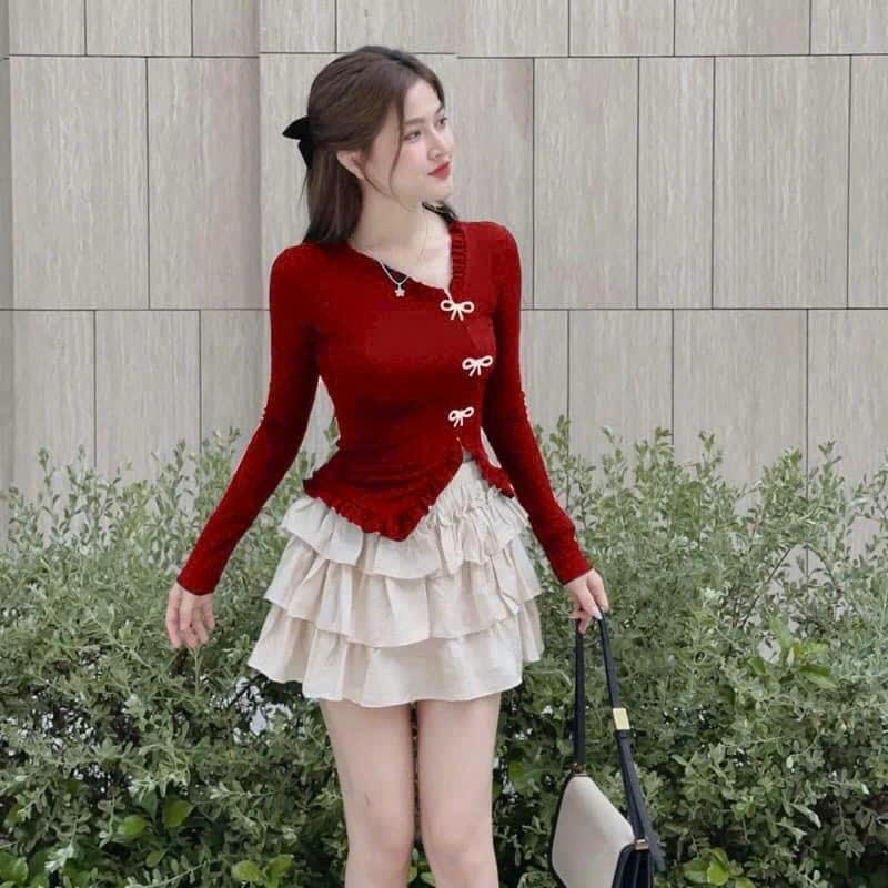 Set áo tay dài màu đỏ kèm nơ chất thun borip phối chân váy tầng chất lụa màu trắng kem