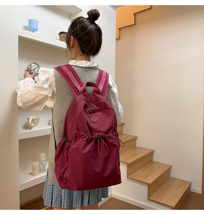 Product Introduction of Backpack, Student Schoolbag, Outdoor Backpack Leisure Simple and Lightweight Early High School Student Schoolbag New Drawstring All-Match Travel Backpack 8