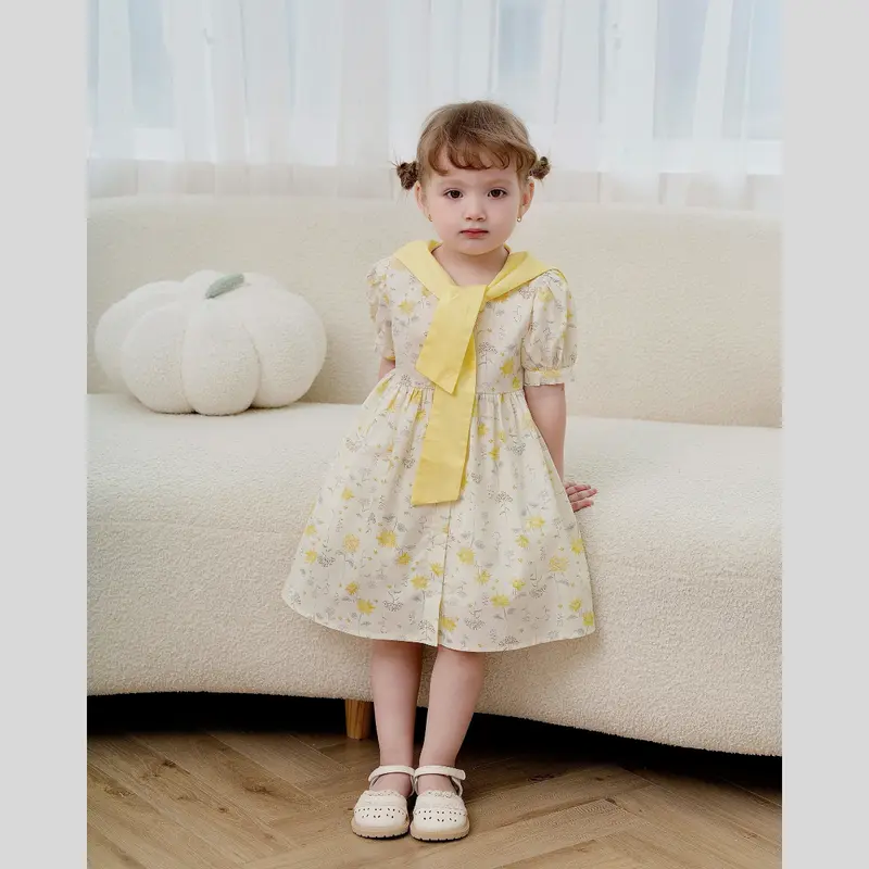Váy bé gái tay bồng chất thô cotton họa tiết hoa phối dây vàng 0