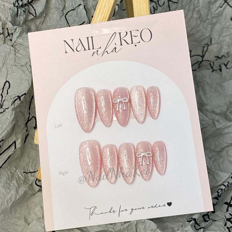 K52- nail box thiết kế Mắt mèo kim cương hồng 09 phối nơ thừng