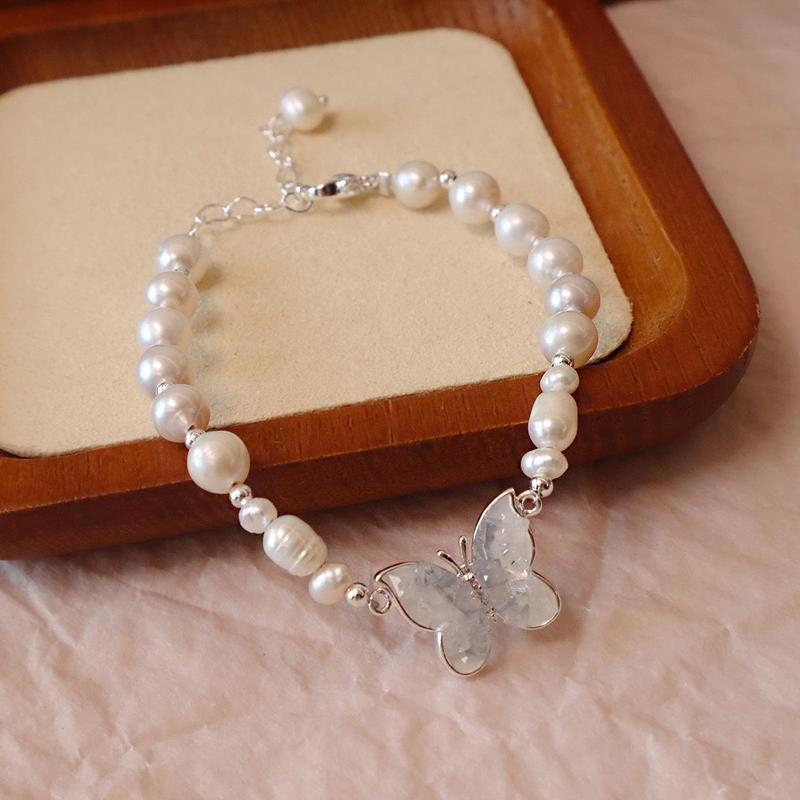  Vòng tay ngọc trai nước ngọt charm bướm đá zircon tự nhiên 