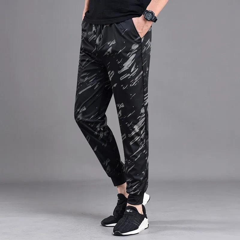 Product Introduction of Autumn Trousers Men Stretch Camouflage Pant Casual Leg Fitting Sweatpants Loose Wear-resistant Trousers 9