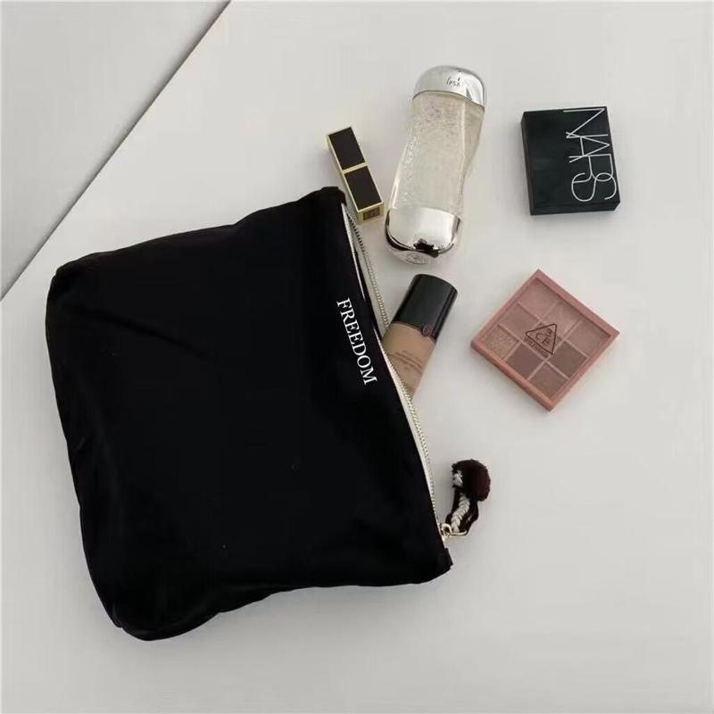 Product Introduction of Niche Cute Hand Canvas Makeup Bag Women's Japanese Ins Simple and Portable Large Capacity Skincare Storage Bag 1